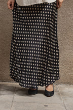 Falda midi topos color negro