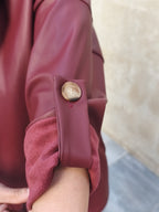 Caqueta con capucha burdeos